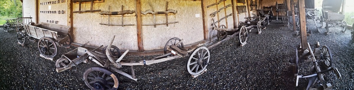 Mill workings and a hay cart in the ASTRA open-air museum, Sibiu