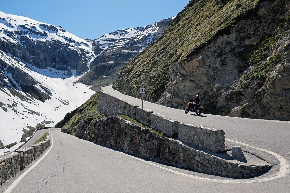 The Stelvio road cut into the rock on the Bolzano side
